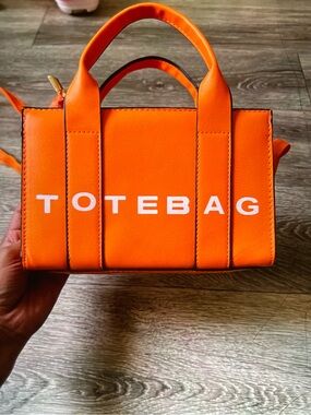 Bright Orange Mini Tote with Bold 'TOTEBAG' Logo